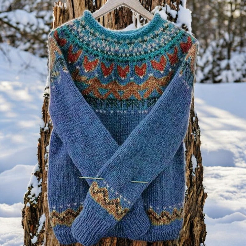 Blue knitted sweater vest with V-neck and multicolor fair isle yoke and cuffs
