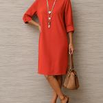 Red midi shift dress with 3/4 sleeves and round neckline