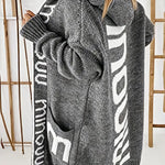 Charcoal-gray hooded knit cardigan with white geometric bands, long sleeves, open front