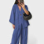 Blue layered V-neck top and wide-leg pants set with button front