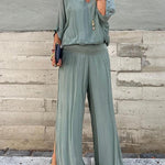 Two-piece chiffon set with V-neck blouse and wide-leg pants, sage green.