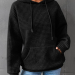 Women’s waffle-knit winter hoodie with hood, drawstrings, and front kangaroo pocket—black