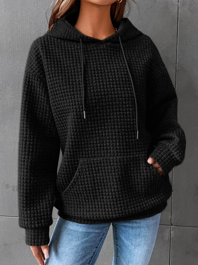 Women’s waffle-knit winter hoodie with hood, drawstrings, and front kangaroo pocket—black