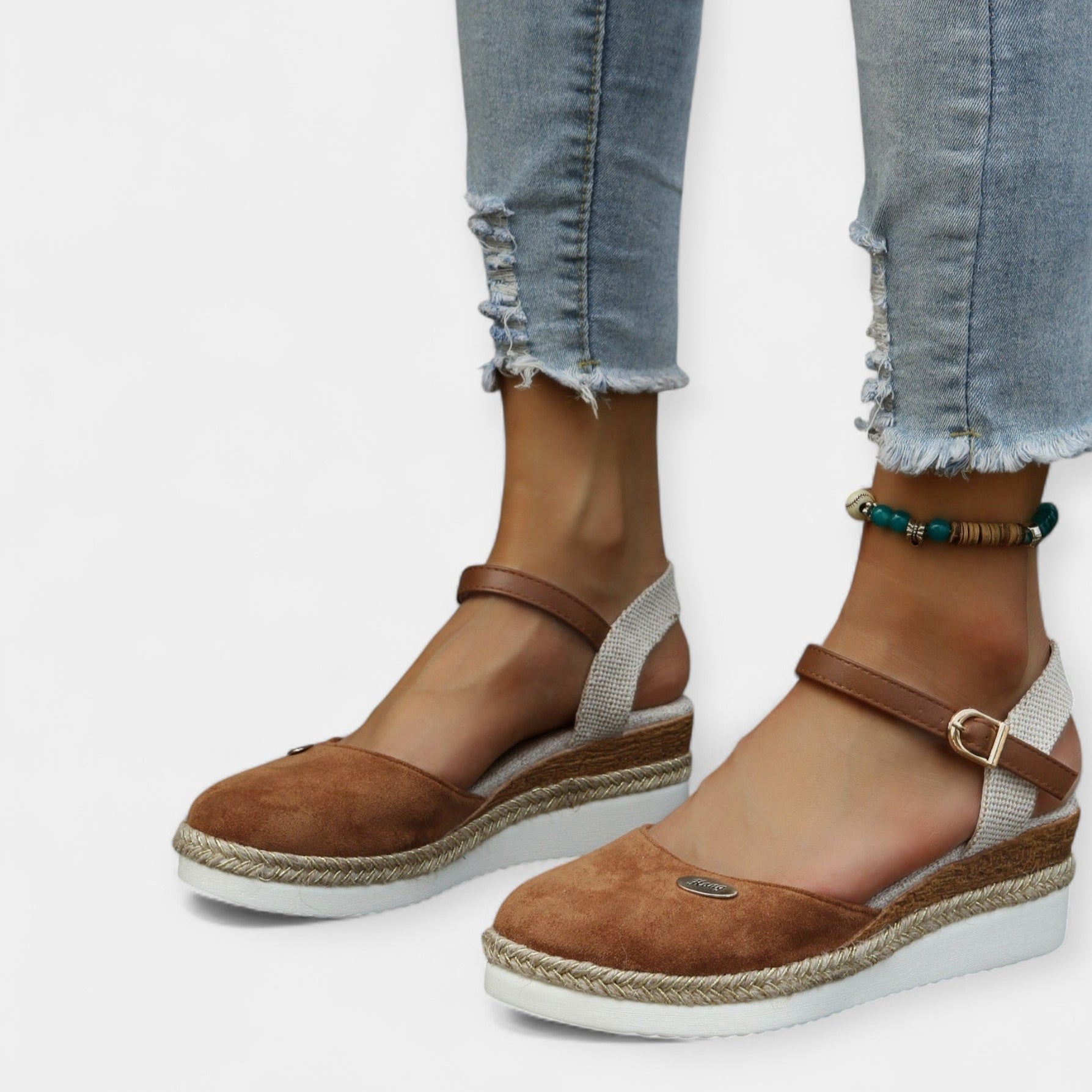 Orthopedic espadrilles with ankle strap and buckle, brown suede and jute-woven sole.