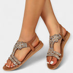 Brown flat sandals with rhinestone flower strap and ankle strap, open toe