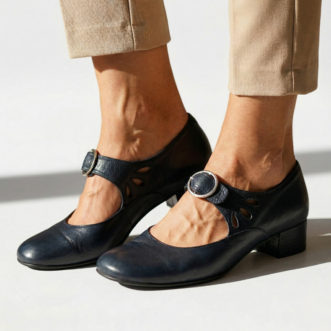 Leni pointed-heel shoes in dark blue with instep cutout strap and round buckle