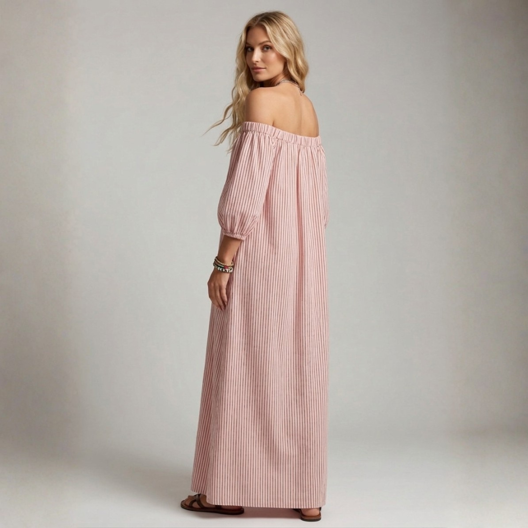 Pink vertical striped off-shoulder maxi dress, side view with gathered sleeves