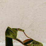 Olive green velvet T-strap heeled sandal with buckled ankle strap