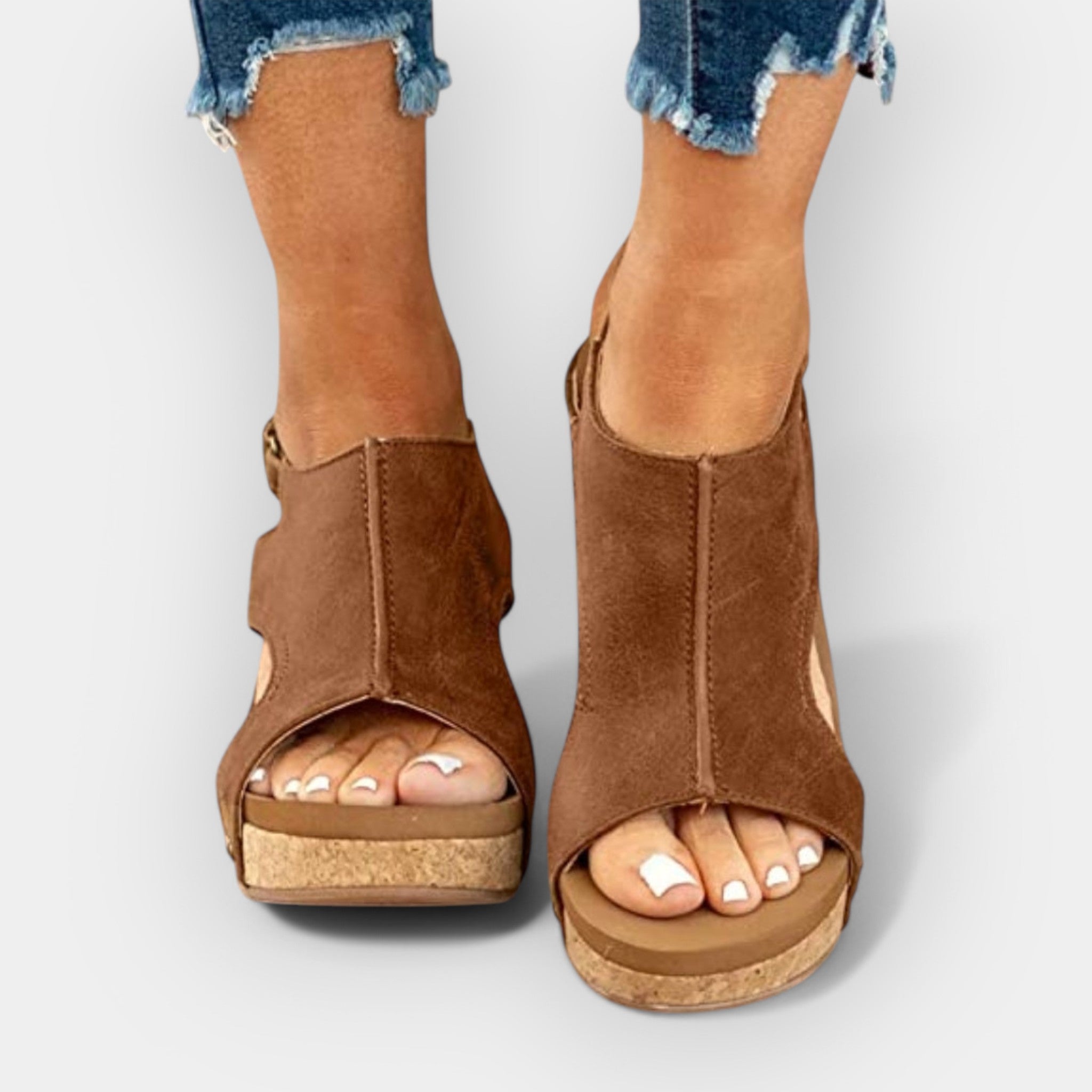 Brown suede platform wedge sandals with open toe and ankle-high cutout