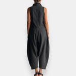 Black sleeveless back-view jumpsuit with loose cropped pants