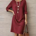 Burgundy midi shift dress with 3/4 sleeves and round neckline