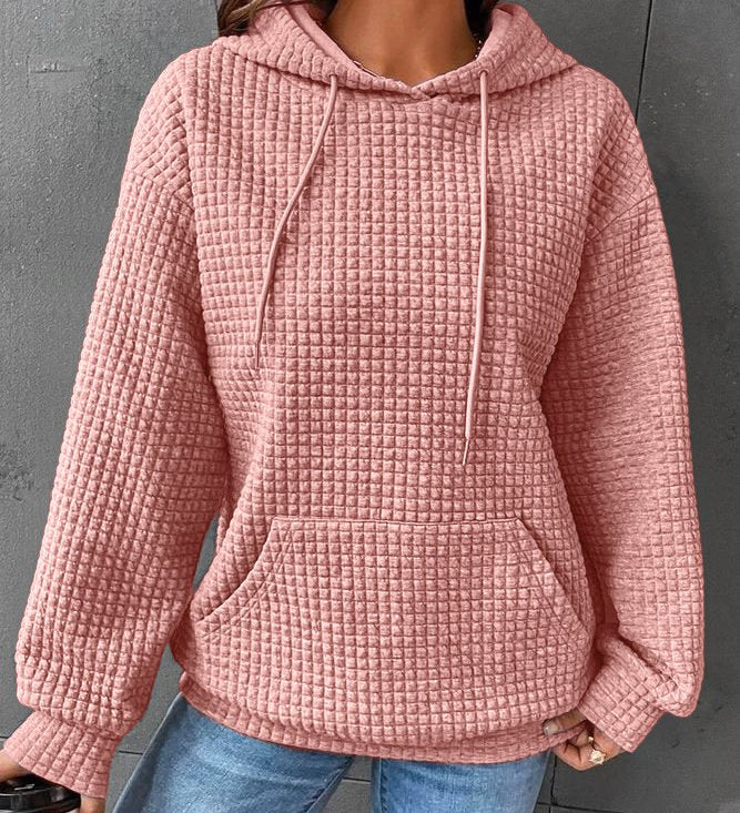 Women’s waffle-knit winter hoodie with hood, long sleeves, drawstrings, and front pocket—pink