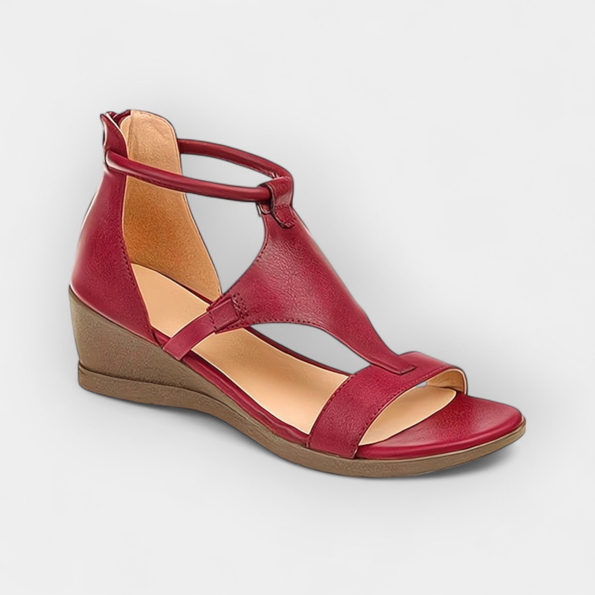 Red leather-look comfort sandals with open toe, cross straps, and wedge sole