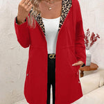 Red reversible hooded jacket with leopard-print lining and front zipper