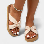 Women's wide bow sandals in cream with braided platform sole and wide toe-bow strap