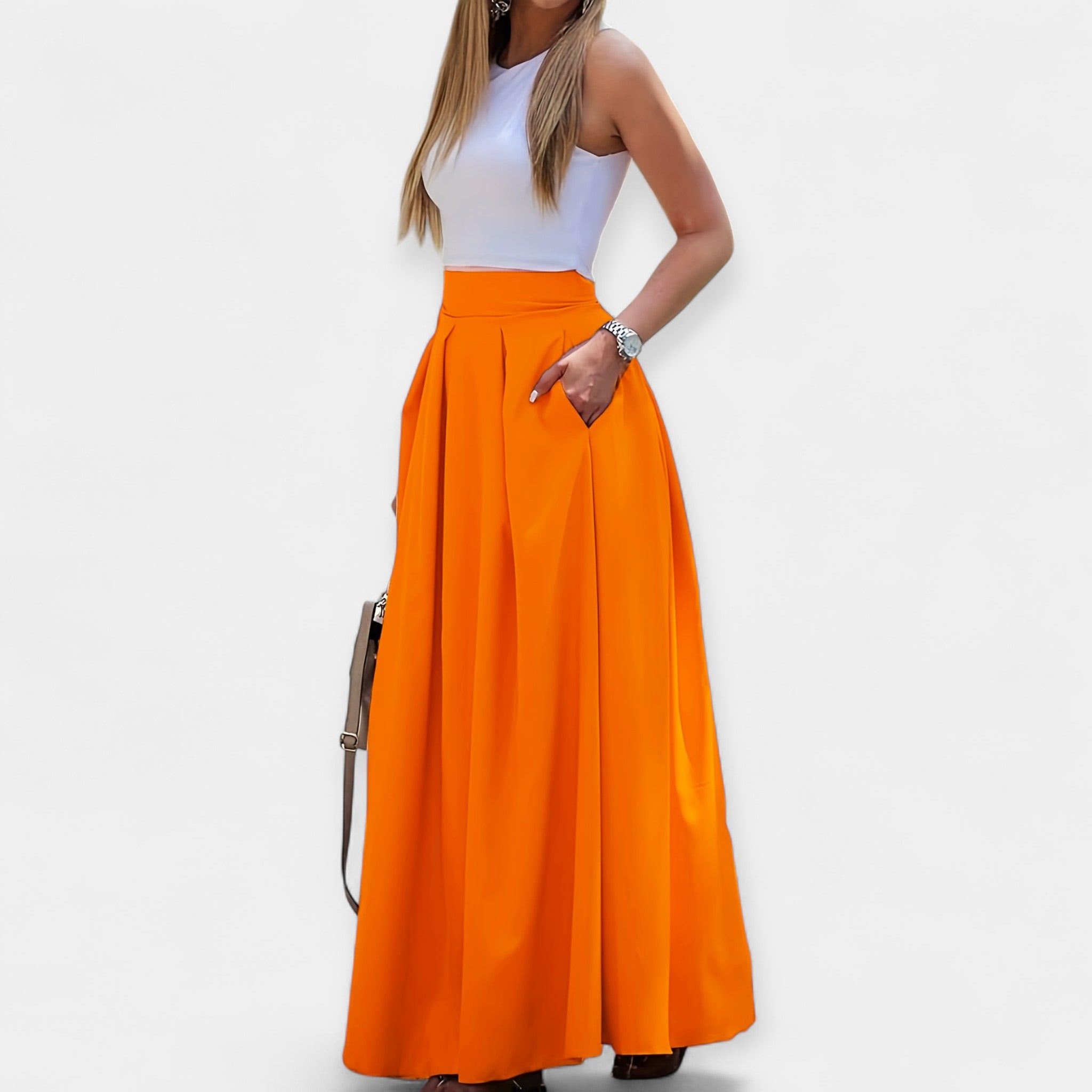 Orange midi skirt with pleated A-line design and wide waistband