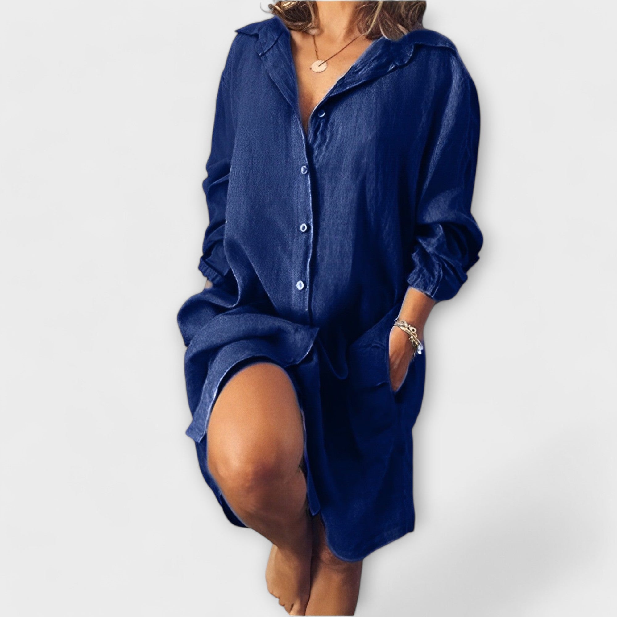 Loose linen shirt-dress, deep blue, button-front, point collar, long sleeves, relaxed fit.