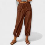 Brown harem pants with elastic waist and side cargo pockets