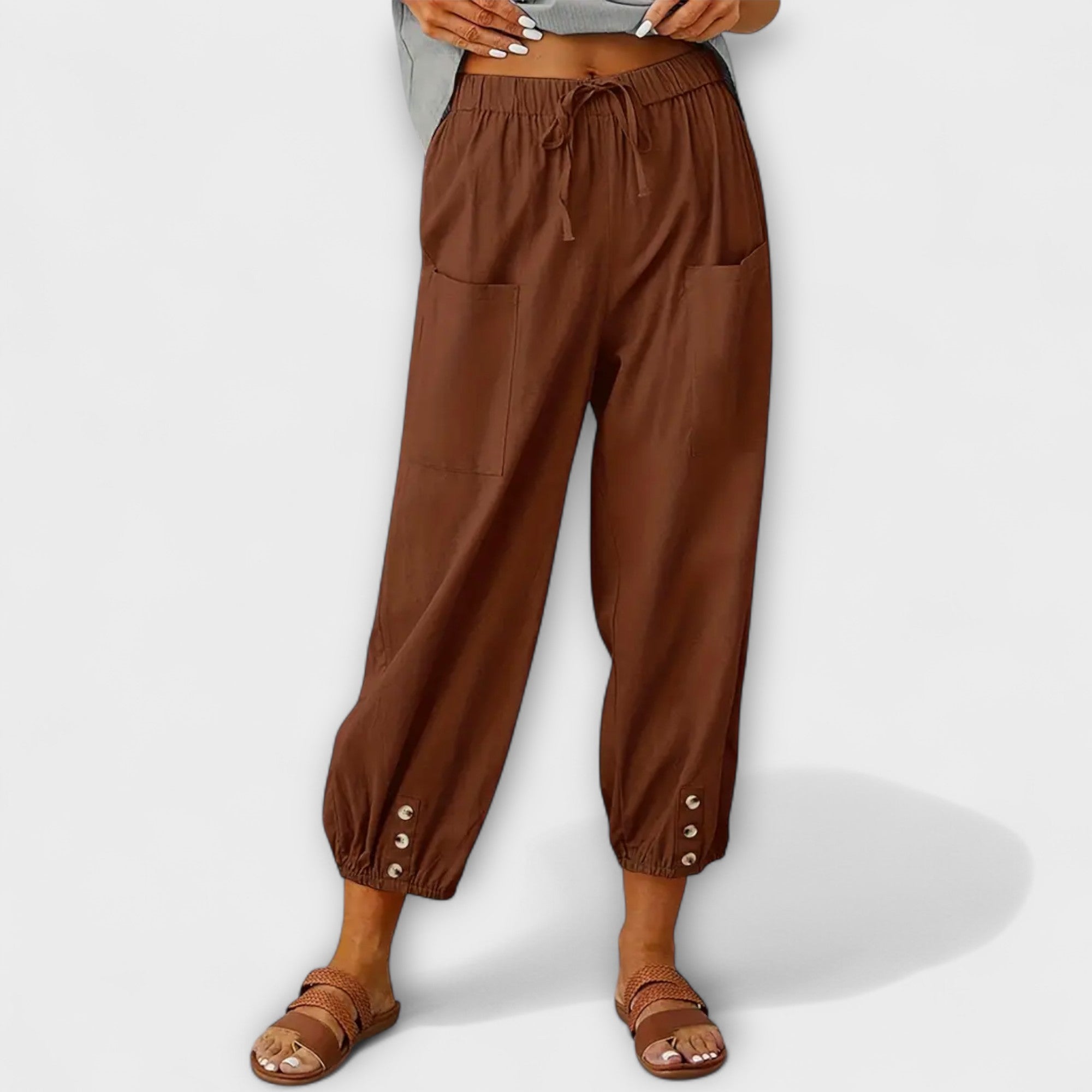 Brown harem pants with elastic waist and side cargo pockets