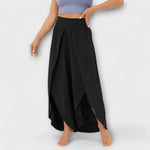 Women’s wide-leg pants with elastic waist, black, long side slit draped hem