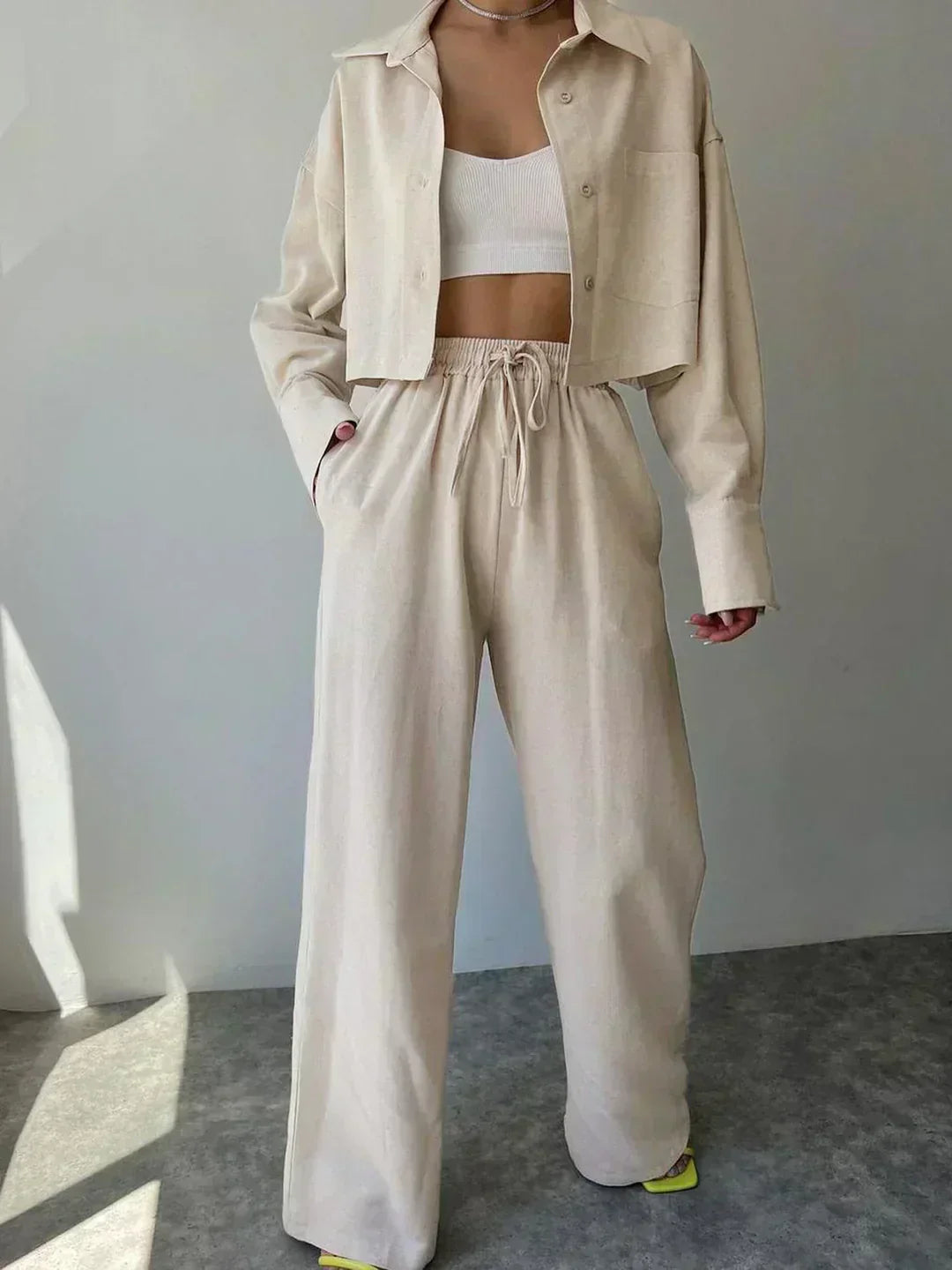 Light beige two-piece set: collared button-up shirt and wide-leg drawstring pants