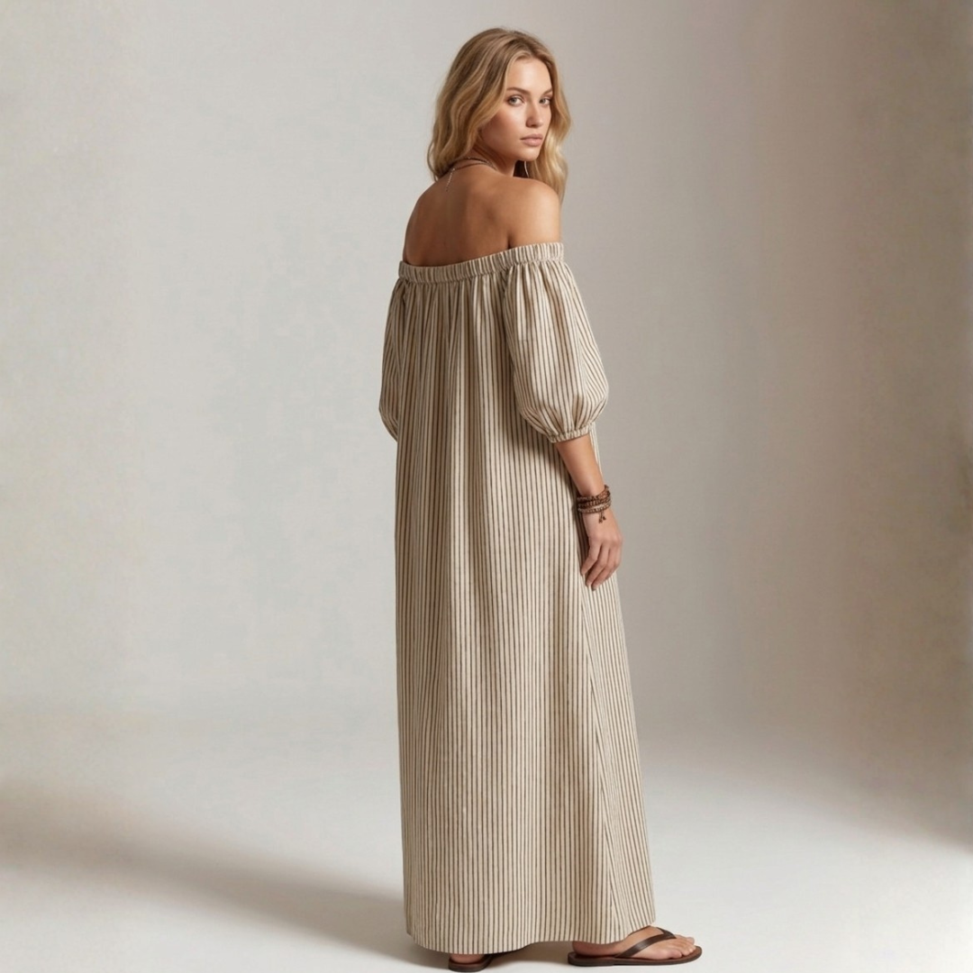 Beige vertical striped off-shoulder maxi dress, side profile with puff sleeves