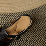 Black natural leather sandal with beige insole and adjustable buckle strap