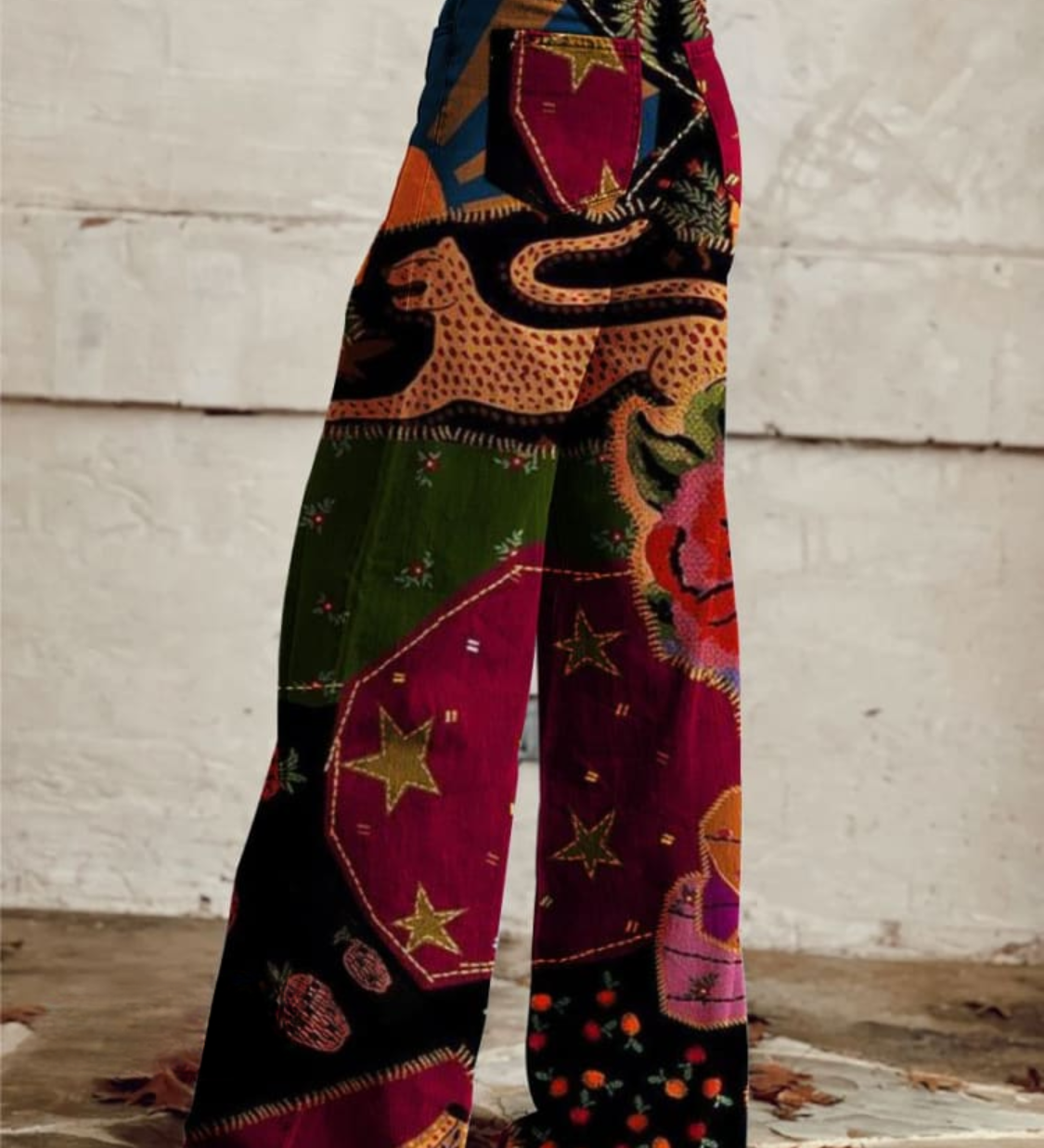 Boho patchwork wide-leg pants with geometric and floral motifs, high-waist button front