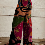 Boho patchwork wide-leg pants with geometric and floral motifs, high-waist button front