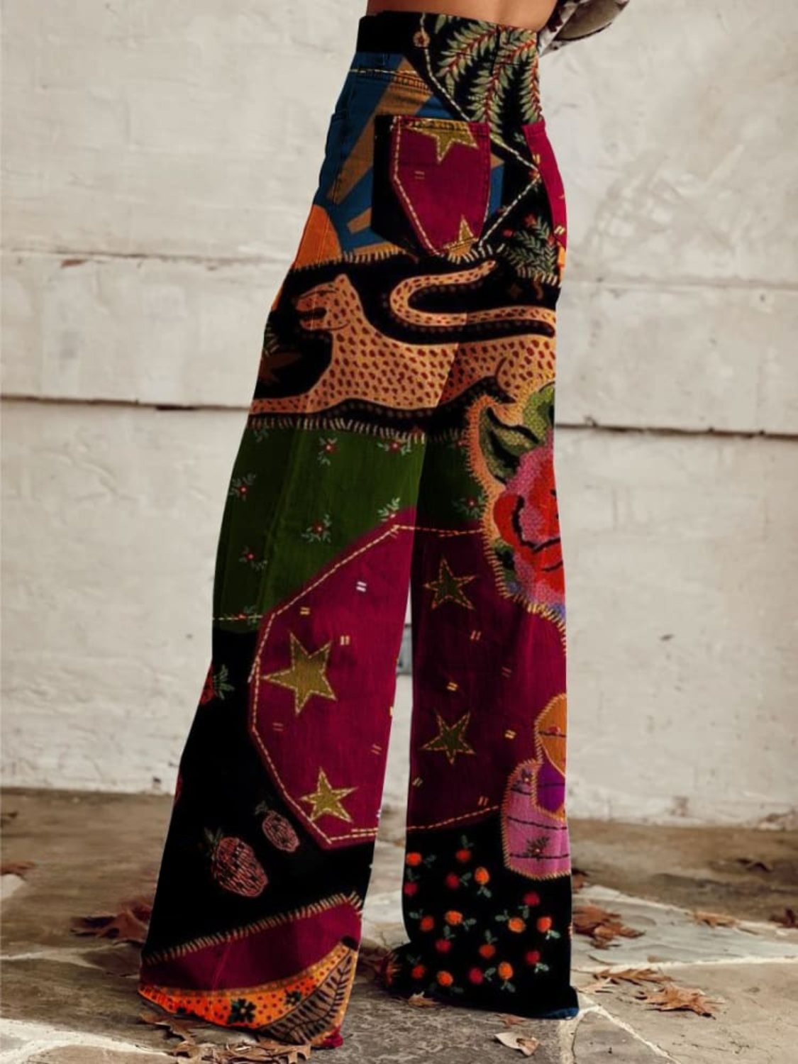 Boho patchwork wide-leg pants with geometric and floral motifs, high-waist button front