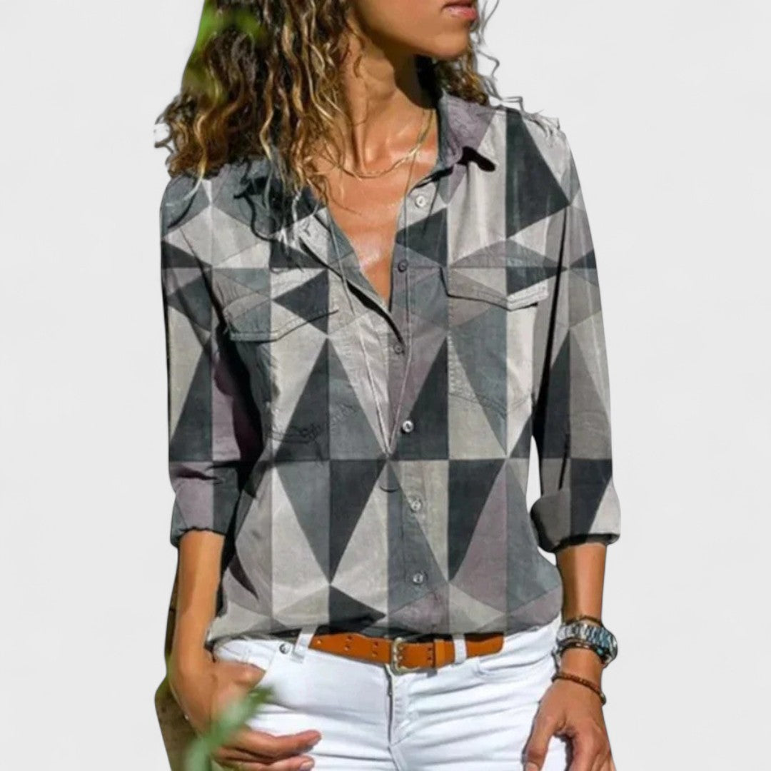Elegant button-up blouse with gray, black, and white geometric pattern, collared, long sleeves