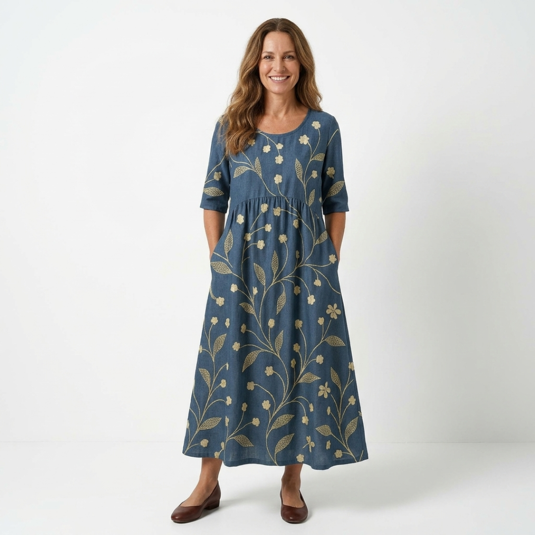 Casual midi dress in dark blue with small gold leaf print, half sleeves, gathered waist