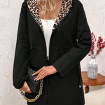 Black reversible zip jacket with leopard-trim hood and inner leopard print reverse side