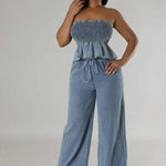 Light blue strapless smocked peplum denim top with wide-leg matching trousers set