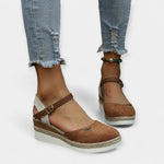 Orthopedic espadrilles with ankle strap and buckle, brown suede, jute-woven wedge sole.