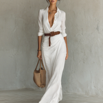 White long-sleeve maxi dress with V-neck button front and brown waist belt, side view