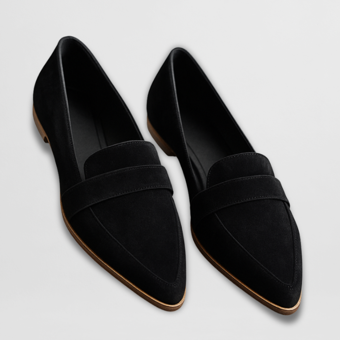 Black suede leather moccasin loafers with slip-on shape and contrast sole trim.