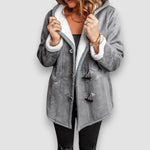Gray hooded winter jacket with soft sherpa lining, toggle front, and sherpa-trim cuffs