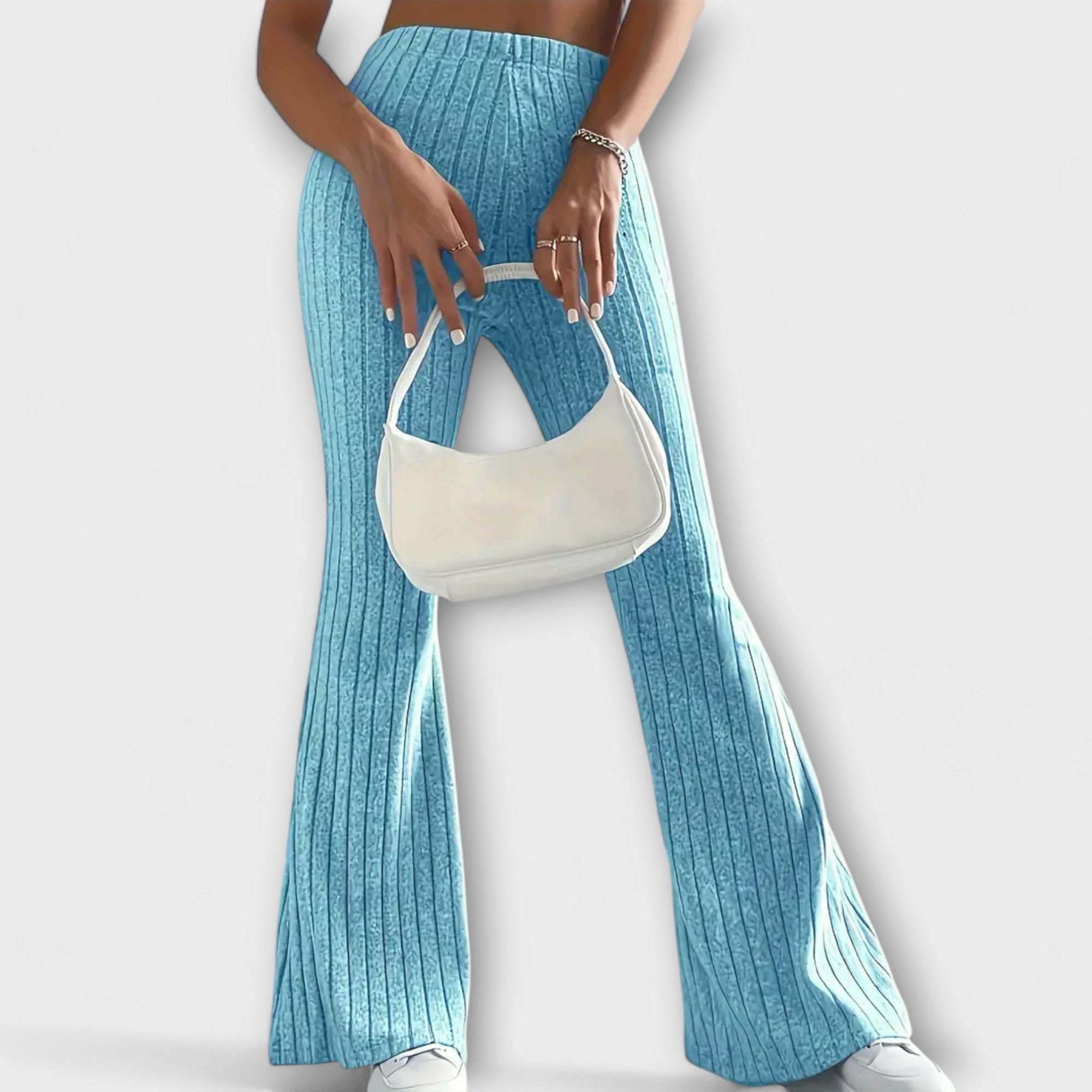 Light blue ribbed knit high-waist flared pants with wide flare and side seam