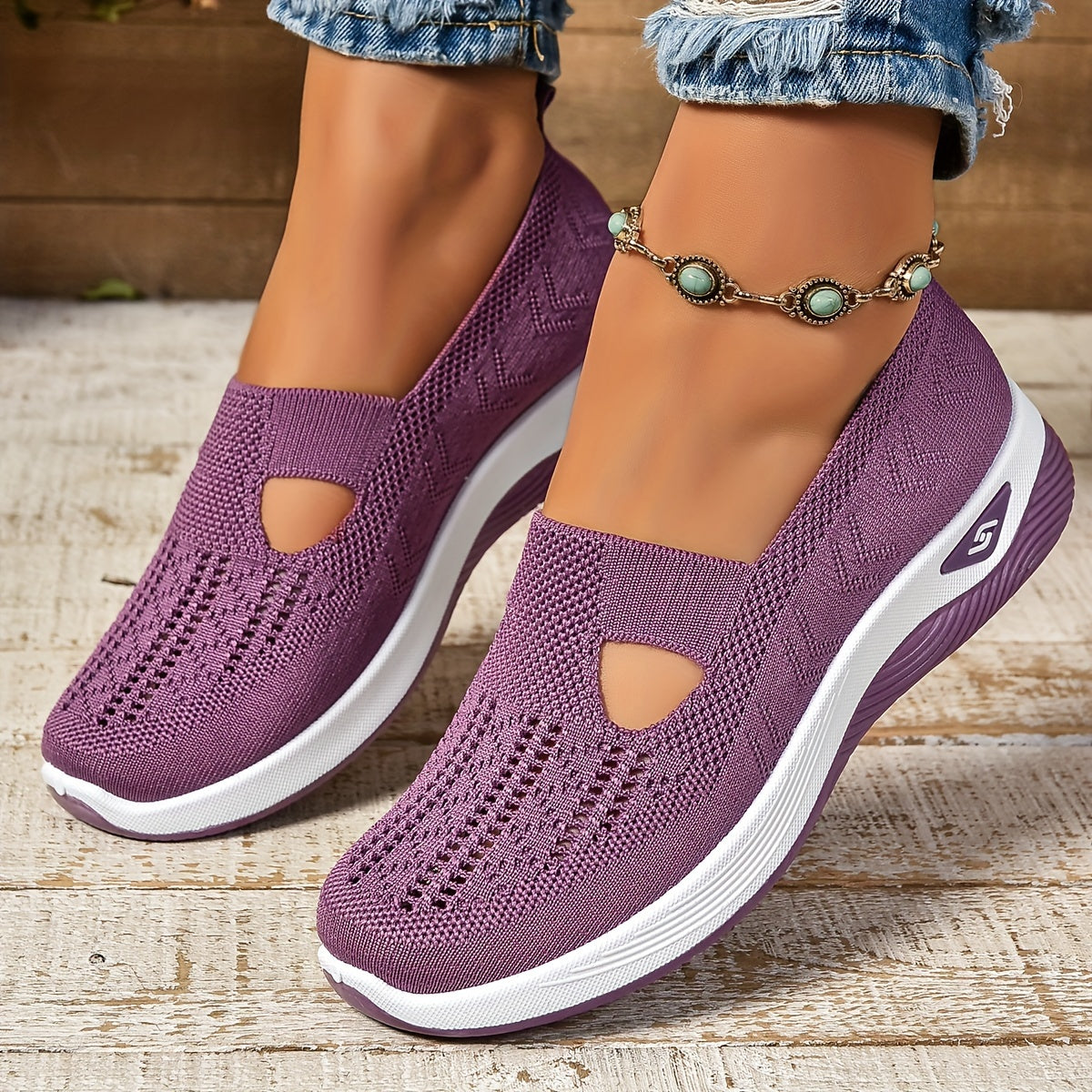 Purple orthopedic knit slip-on sneakers with breathable cutout design and white sole