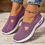 Purple orthopedic knit slip-on sneakers with breathable cutout design and white sole