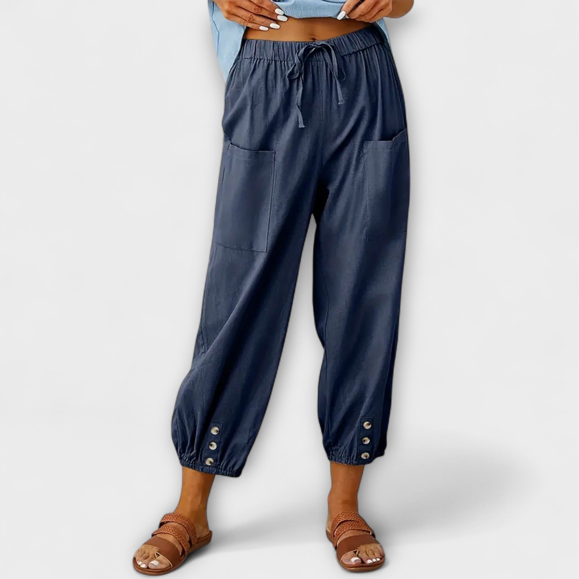 Navy blue harem pants with elastic waist and side cargo pockets
