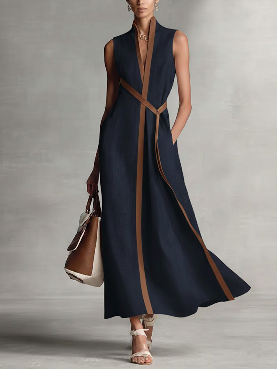 Elira linen dress in dark navy, V-neck, diagonal tan tie accents, sleeveless maxi