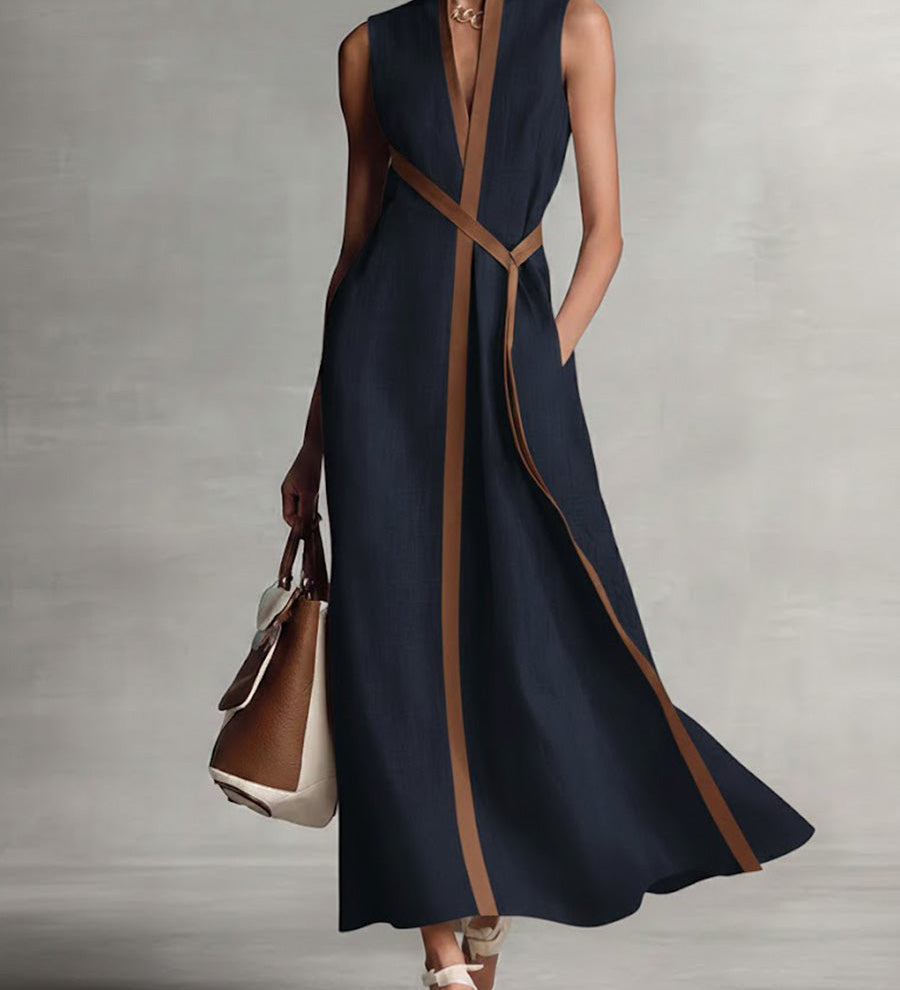 Elira linen dress in dark navy, V-neck, diagonal tan tie accents, sleeveless maxi