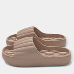 All-season slippers, beige molded slip-on slides with textured footbed and wide strap