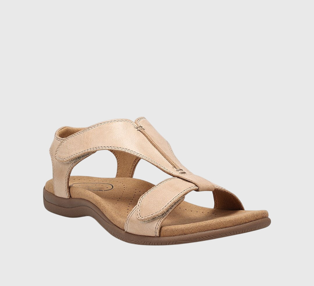 Beige orthopedic sandals with open toe, cushioned footbed, and two padded straps