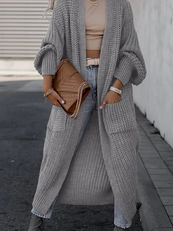 Light gray long cardigan with textured knit, open front, and roomy side pockets