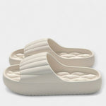 All-season slippers, off-white molded slip-on slides with textured footbed and wide strap