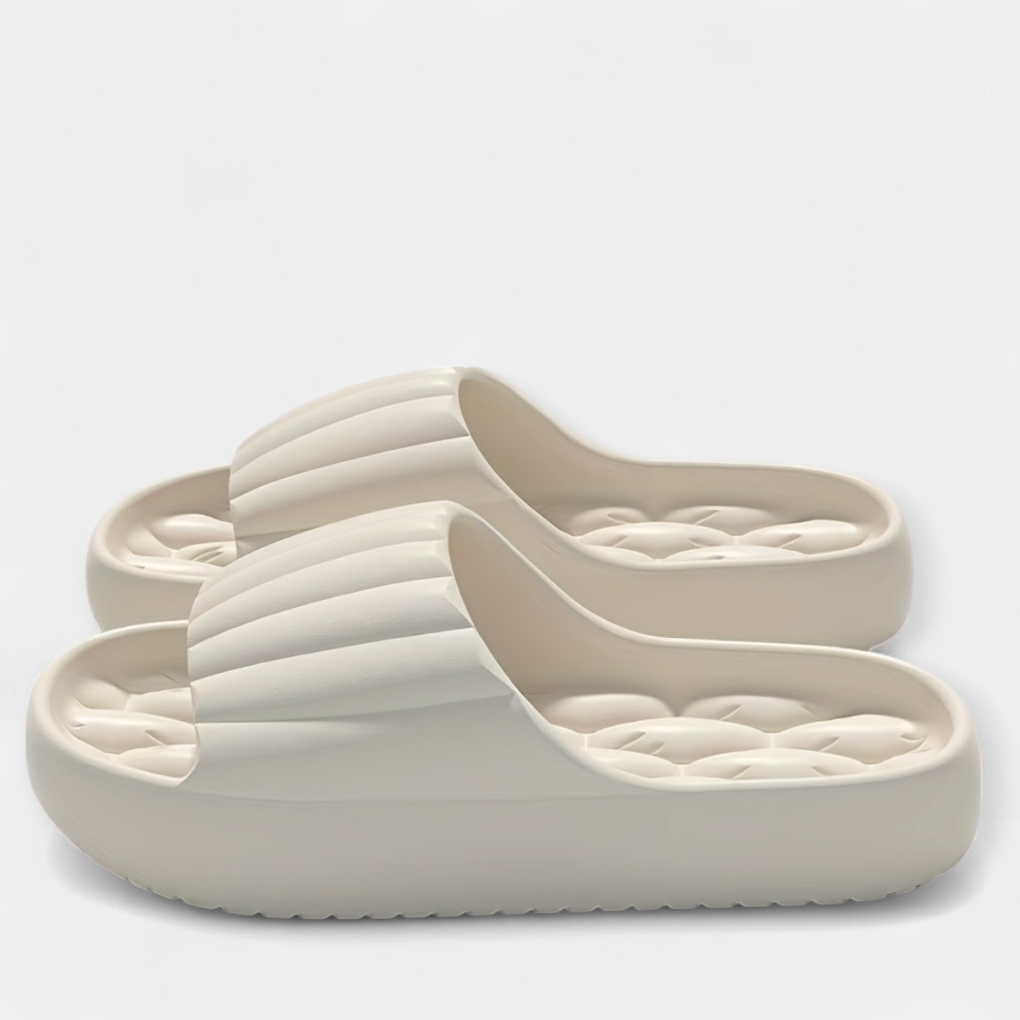 All-season slippers, off-white molded slip-on slides with textured footbed and wide strap