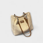 Cream ribbed shoulder bag with chain strap and square front label